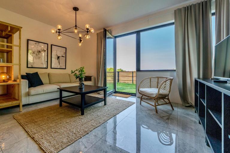 Apartament nadmorski z ogródkiem - Chambres d'hôtes Mechelinki