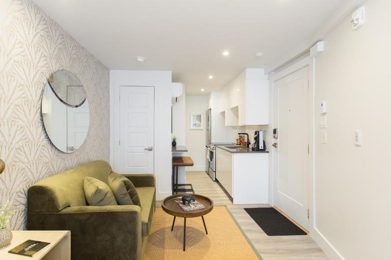 Serene and Styled Little Italy Studio full bath by Den Stays - B&B Montreal