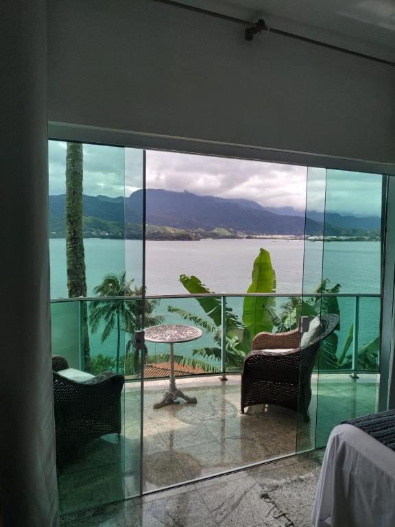 Suites na Casa da Praia - B&B Ilhabela