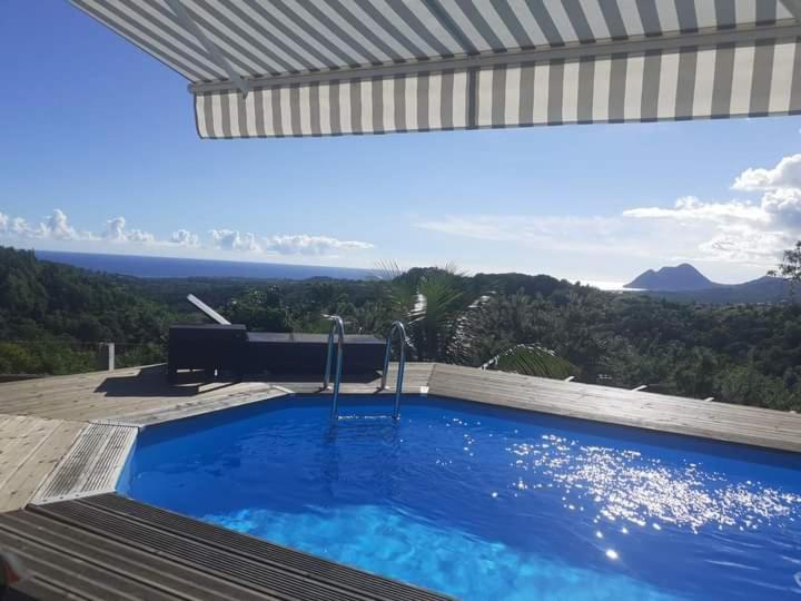 Chambre chez l'habitant avec piscine privative et vue panoramique sur la mer des caraïbes - B&B Desmarinières