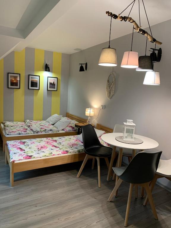 Pokoje ArkaSasino z sauną ogrodową - Chambres d'hôtes Sasino