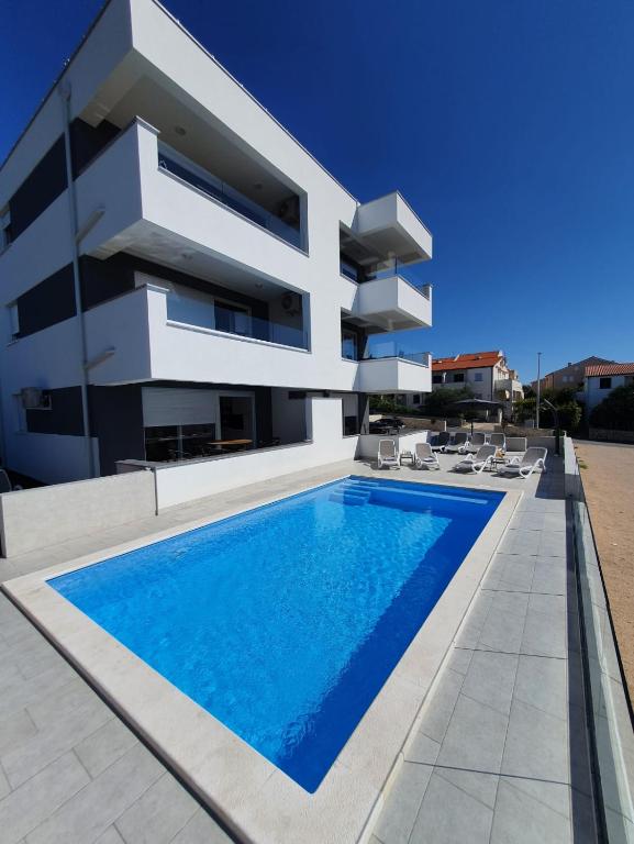 Seahorse Luxury apartment with pool and sea view - Chambres d'hôtes Novalja