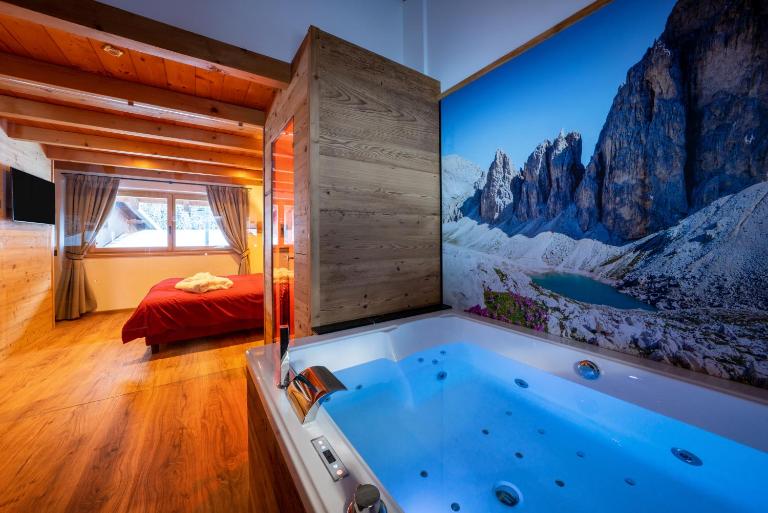Orchidea Suite & SPA Apartments - Ferienwohnung Canazei