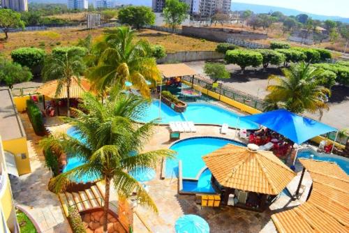 FLAT para Temporada perto SINGAPURA SHOPPING com 7 PISCINAS, Bar Molhado, Restaurante - A 3 min CENTRO DE CALDAS NOVAS! - B&B Caldas Novas