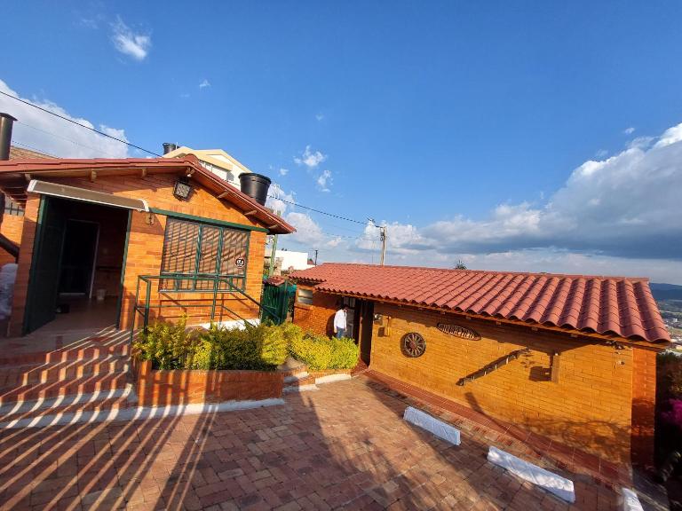 Villa Bremen, Hospedaje Rural con vista al Lago - Ferienwohnung Paipa