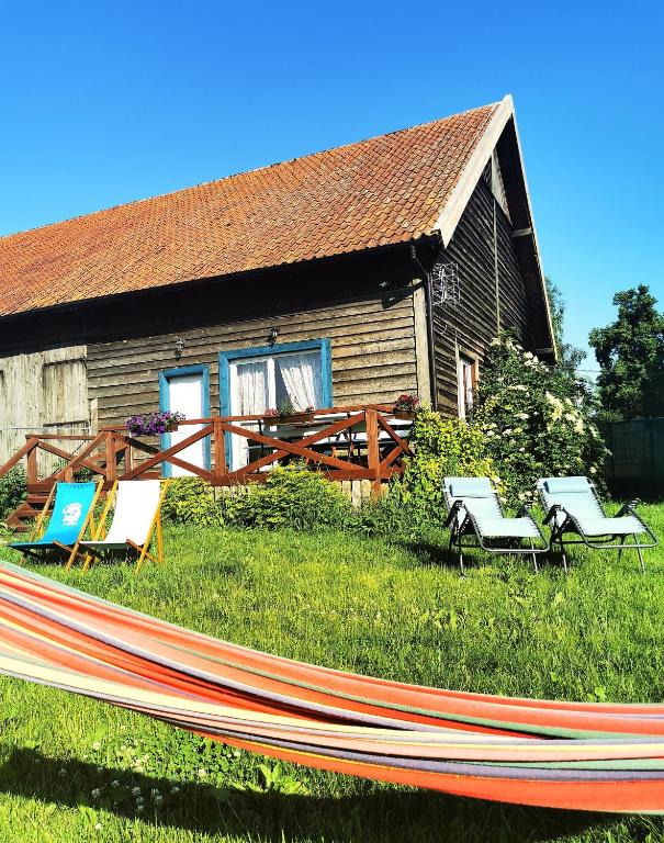 Mazurski Pejzaż - dom z widokiem i ogrodem - B&B Radzie