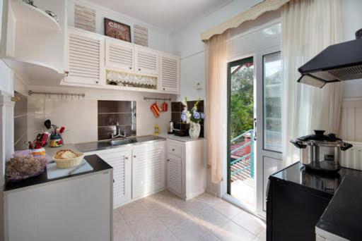 Alexandra Apartment - Chambres d'hôtes Gáïos