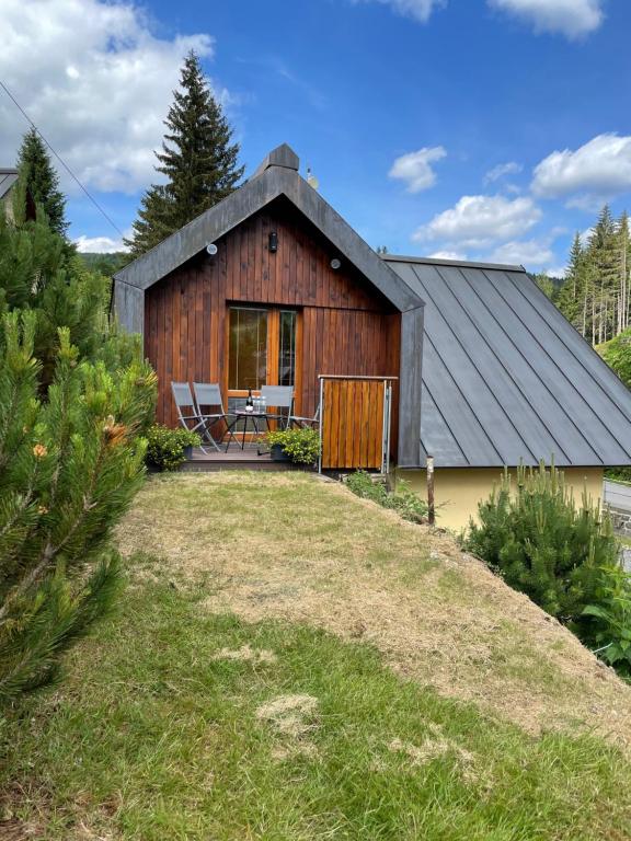 Luxusní samostatný apartmán GARAGE Harrachov s výhledem na skokanské můstky, kryté parkováni a WiFi zdarma - B&B Harrachov