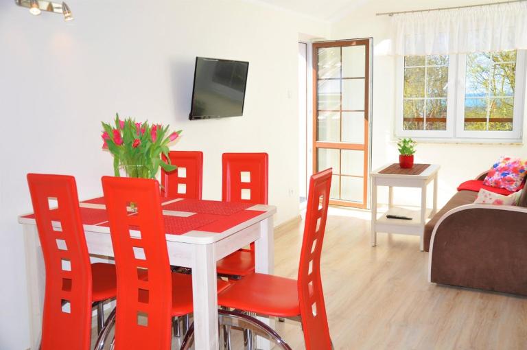 Apartamenty MAGELLAN Przy Plaży - Chambres d'hôtes Rowy