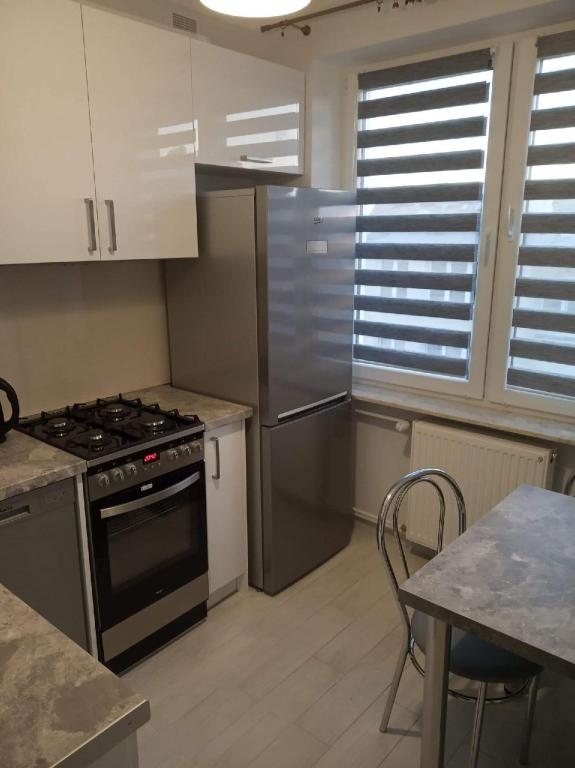 Apartament w Centrum Giżycka - Chambres d'hôtes Giżycko
