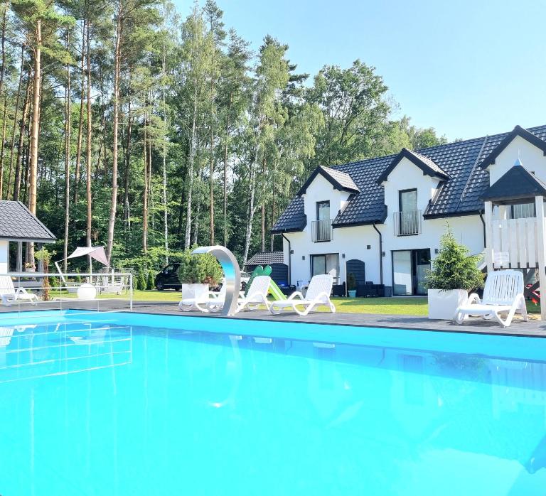 Nadmorska Przystan Apartamenty - Basen, sala zabaw, rowery, animacje - B&B Ustka