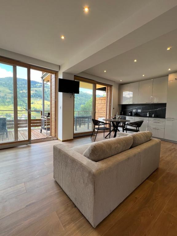 Magnifique appartement classé 4 étoiles avec Sauna et terrasse dans chalet - Chambres d'hôtes La Bresse