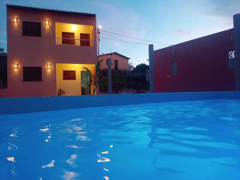 Duplex de 2 quartos com ar condicionado , piscina e estacionamento - Chambres d'hôtes Aracati