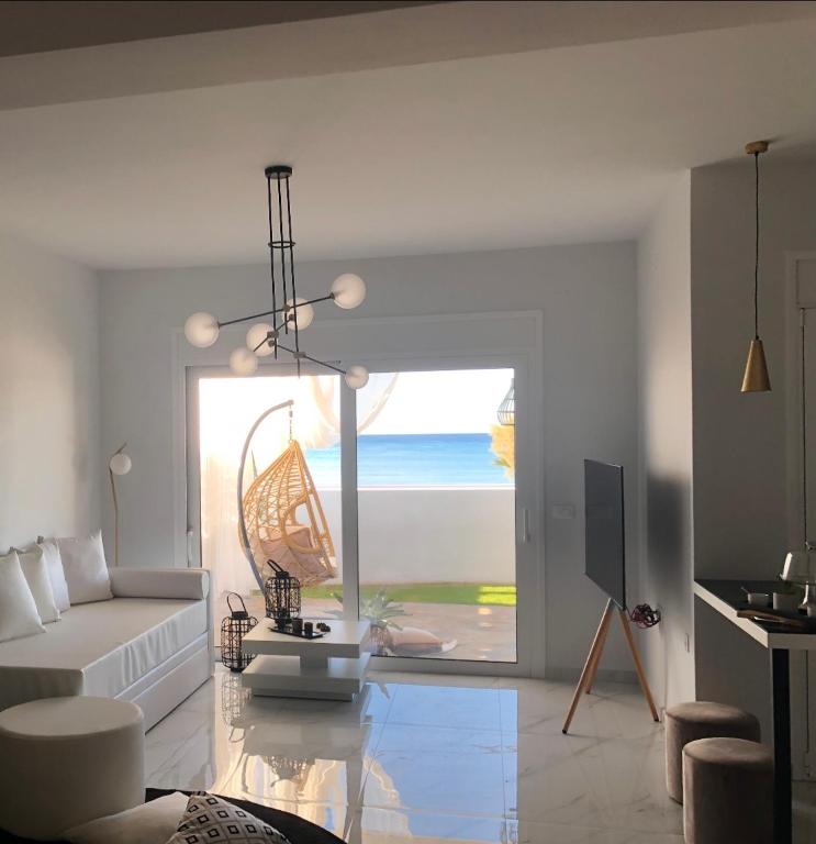 Longbeachvillas 2 Thesia beachfront villa - B&B Makry-Gialos