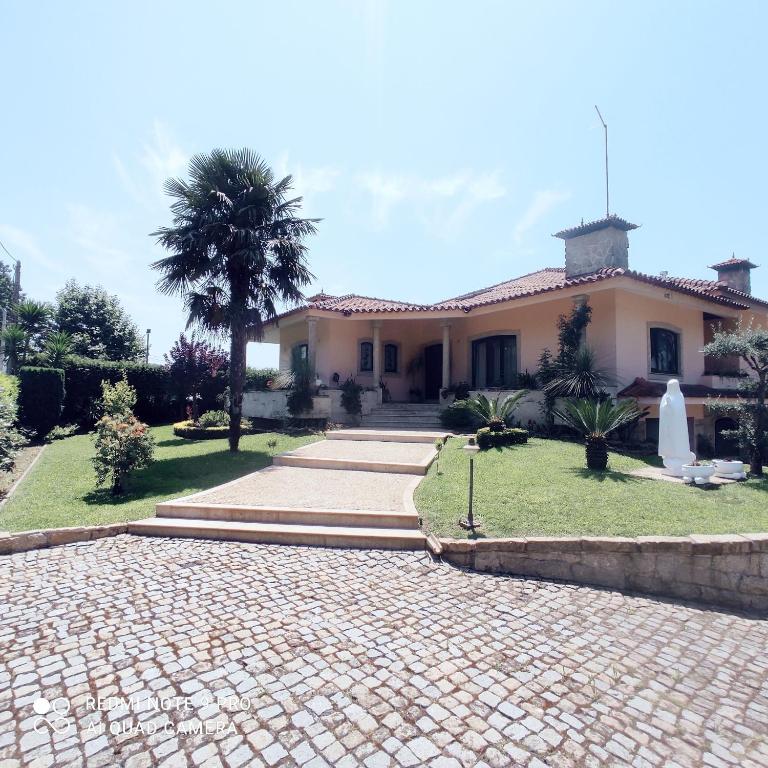 Casa Além Rio - quartos para 6 hóspedes em Santo Tirso - Chambres d'hôtes Santo Tirso