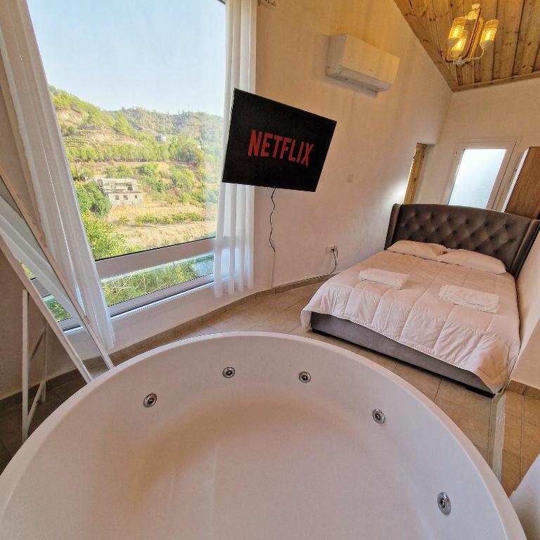 Aprosmeno Jacuzzi House 4 - B&B Agrós