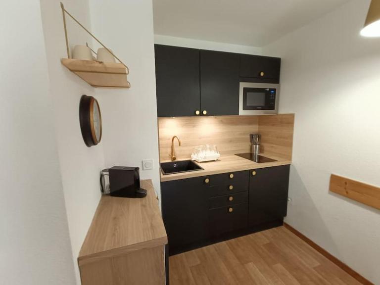 Snowliday - Appartement pour 4 personnes, au pied des pistes, en résidence 4 étoiles - Chambres d'hôtes Valmeinier