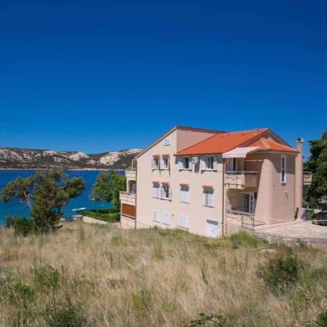 Apartmani Kaštel - Chambres d'hôtes Stara Novalja