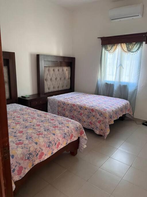 Flores Condominios Depa Lili - B&B Alamos