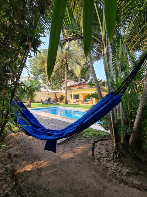 Sompteuse villa avec piscine à 5 min de la plage - B&B Pointe-Noire