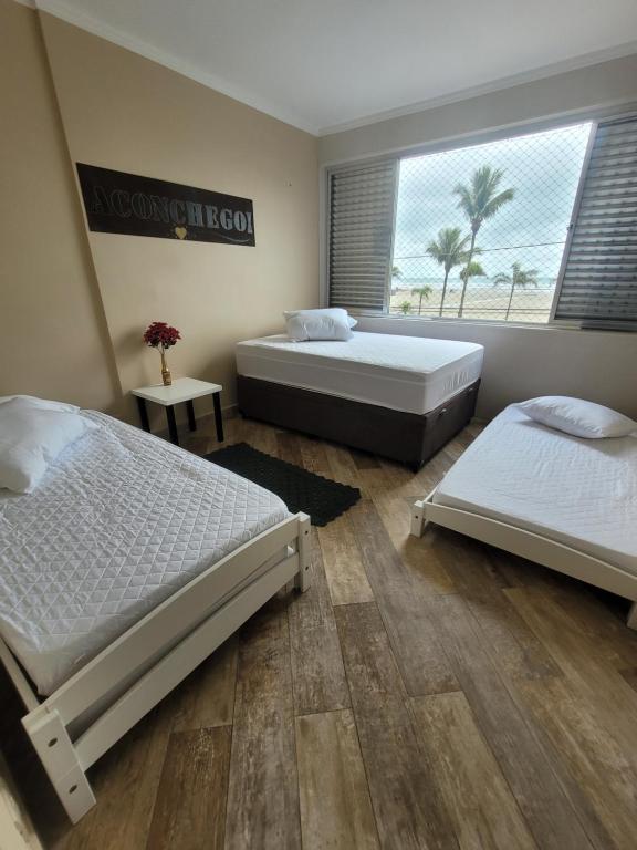 Apartamento Aconchego Frente Mar - Vila Guilhermina Praia Grande SP - Cozinha Completa - Climatizador de Ar - TV a Cabo - Wi-Fi - B&B Praia Grande