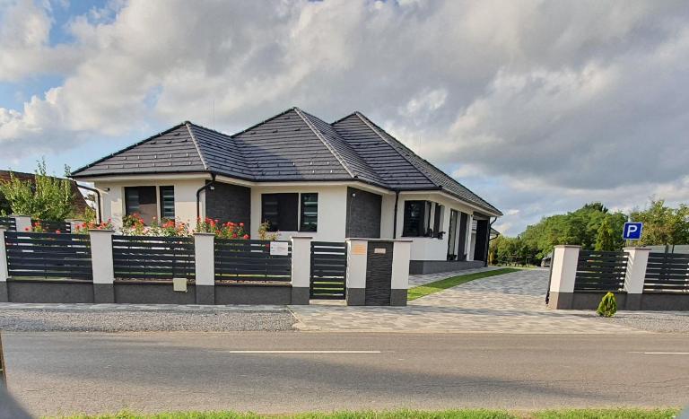 Solymos Apartmanház - Chambres d'hôtes Vámosatya