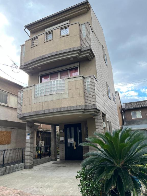 Guest House Kubo Homes Matsu - B&B Osaka