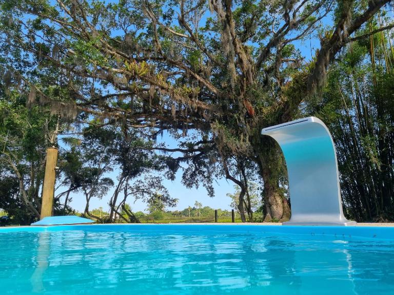 Sítio com piscina Hidromassagem com acesso ao Rio Mampituba - B&B Passo de Torres