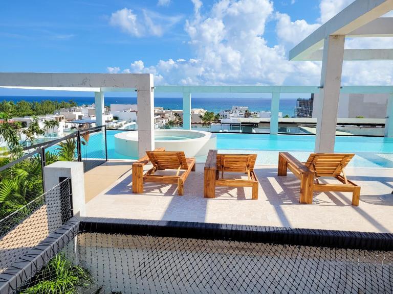 Ceren Luxury Apartments at Fifth Avenue by Spot Rentals - Bed and Breakfast Playa del Carmen