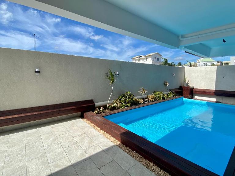 Sandstone Apartment a walk to the beach - B&B Flic en Flac