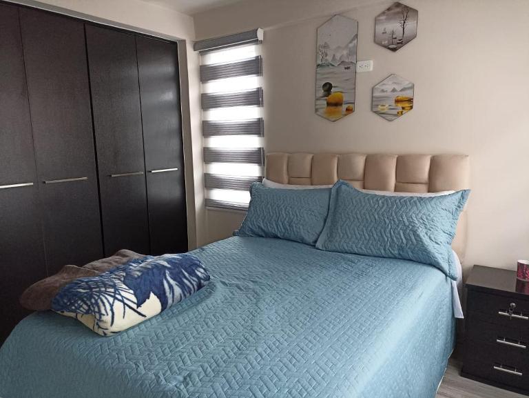 Lujoso Apartamento Frente al Estadio Bellavista - Chambres d'hôtes Ambato