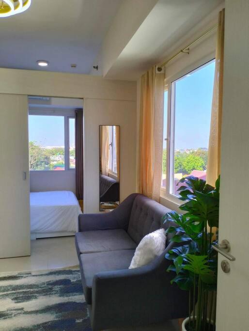 Cozy 2BR corner unit in a prime location, your perfect city home - B&B Manila