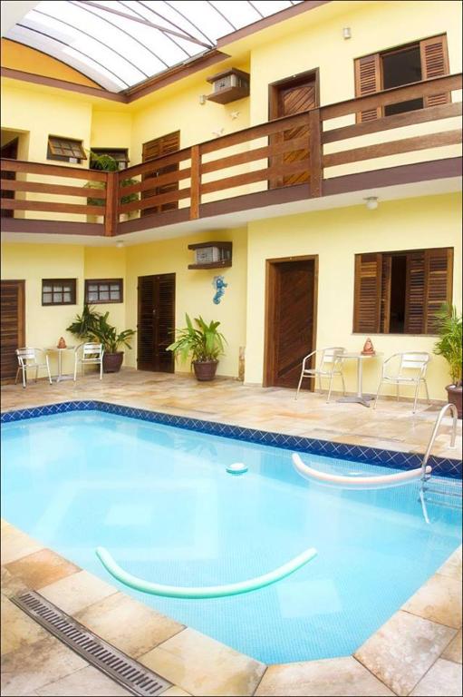 Pousada Solarium UNIDADE 1 ECONOMICA-BÁSICA - Chambres d'hôtes Guarujá