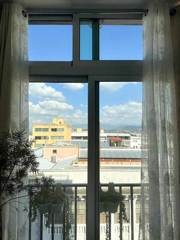 Entre Rosas y Flores - Apartamento en el edificio Centro Vivo - Ferienwohnung Guatemala-Stadt
