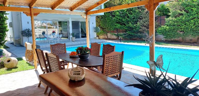 Luxury apartment SEA HELM with private swimming pool and BBQ - Ferienwohnung Lagonísi