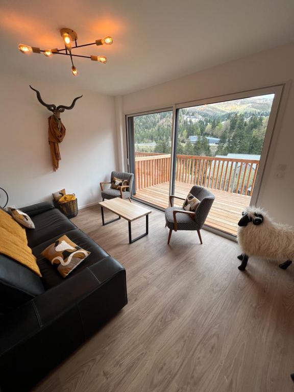 APPARTEMENT AUX PIEDS DES PISTES DE SKI - Chambres d'hôtes Laveissière
