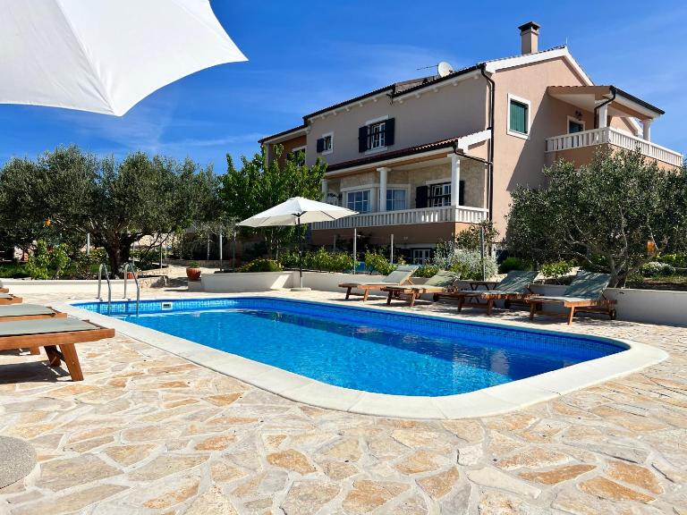 Apartments JoDi pool Novalja - Chambres d'hôtes Novalja