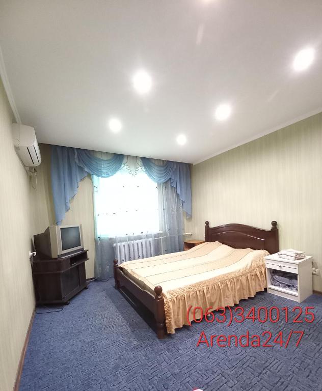 2 комн кв юзр с кондиционером, раздел комнаты - B&B Cherkasy