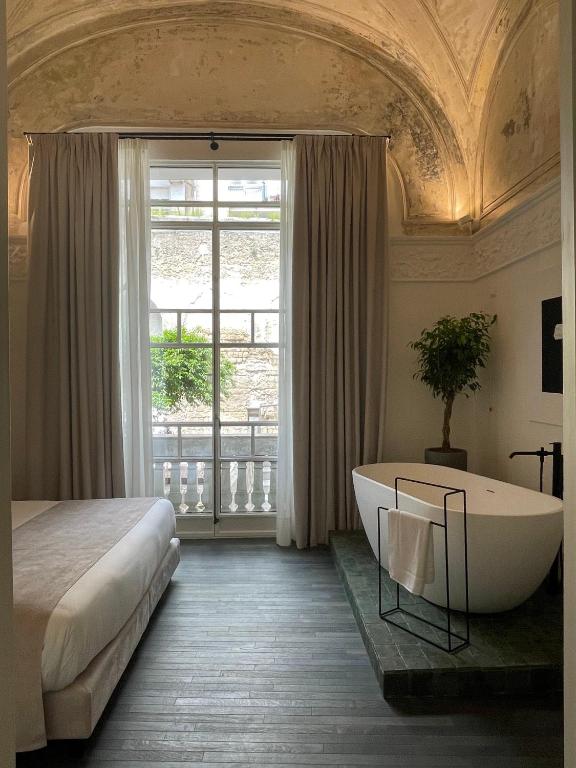 Artemisia Domus - Giardino - Bed and Breakfast Napels