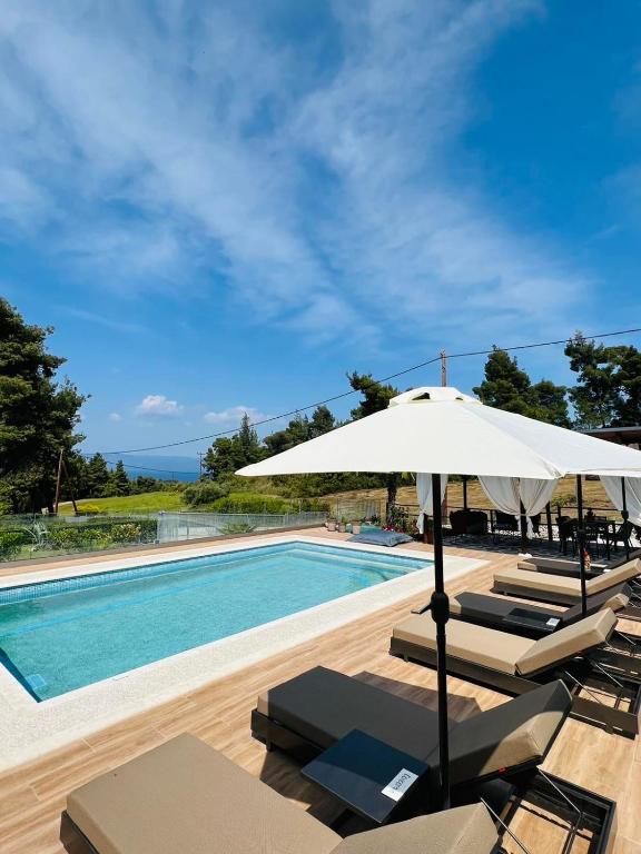 Eden apartments Paliouri- Concordia apartment - Chambres d'hôtes Palioúri