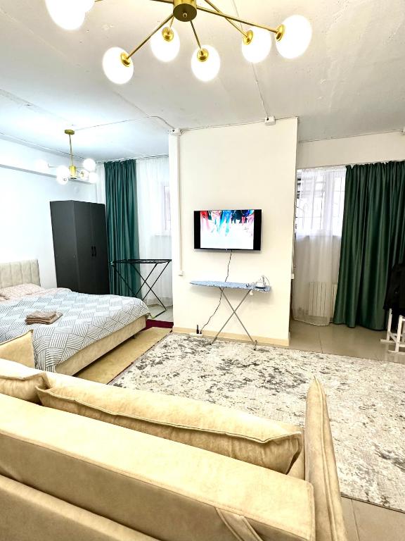 Evita Apartment студия - Chambres d'hôtes Bichkek