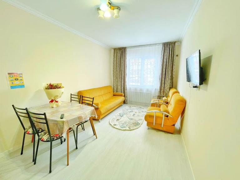 Уютная квартира в центре возле АДК - B&B Almaty