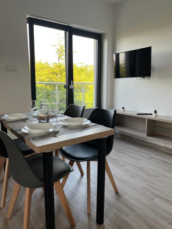 Apartamenty Pod Jodłami - Chambres d'hôtes Sarbinowo