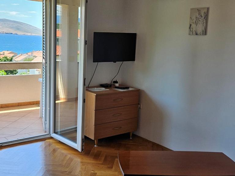 Apartments TROJAK - Bed and Breakfast Baška