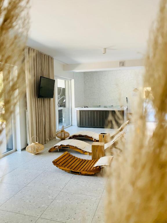 WEST Apartamenty na Wydmach - Chambres d'hôtes Pobierowo
