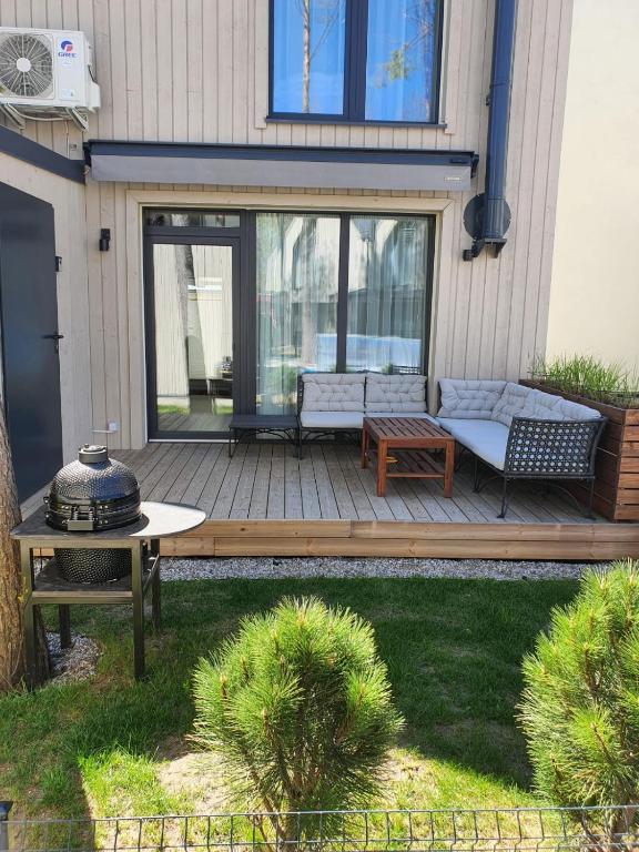 Flamingo apartamentai Čiki Puki - Chambres d'hôtes Palanga