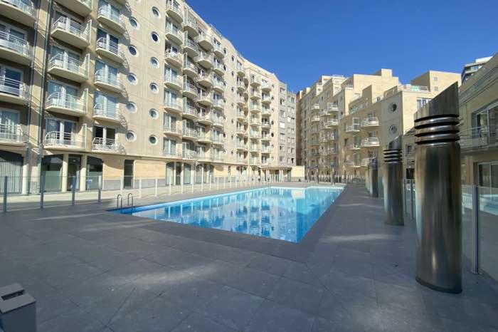 Appartement met zeezicht, zwembad & garage - Chambres d'hôtes Ostende