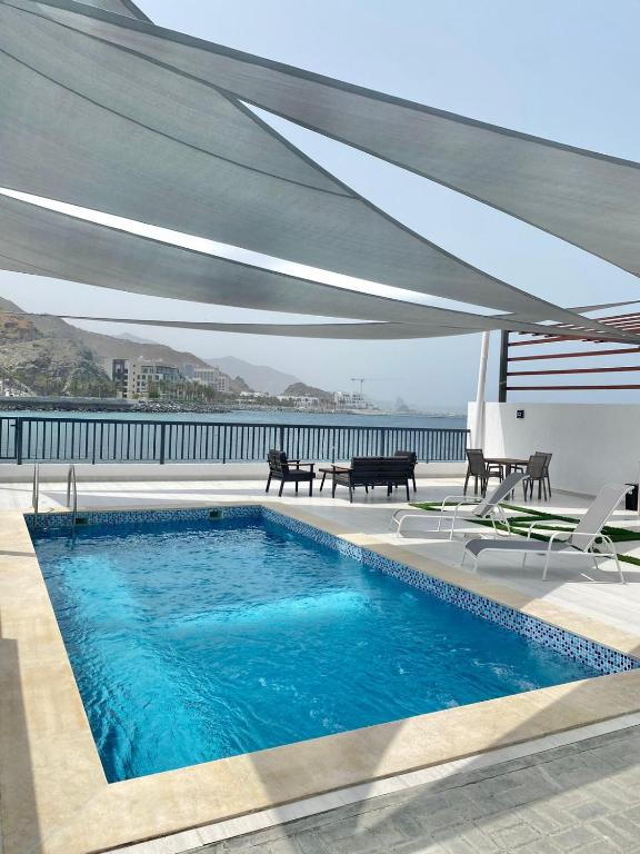 The Pearl Villa - Swimming Pool with Sea and Mountain view - Al Dana Island Fujaira - B&B Fujairah