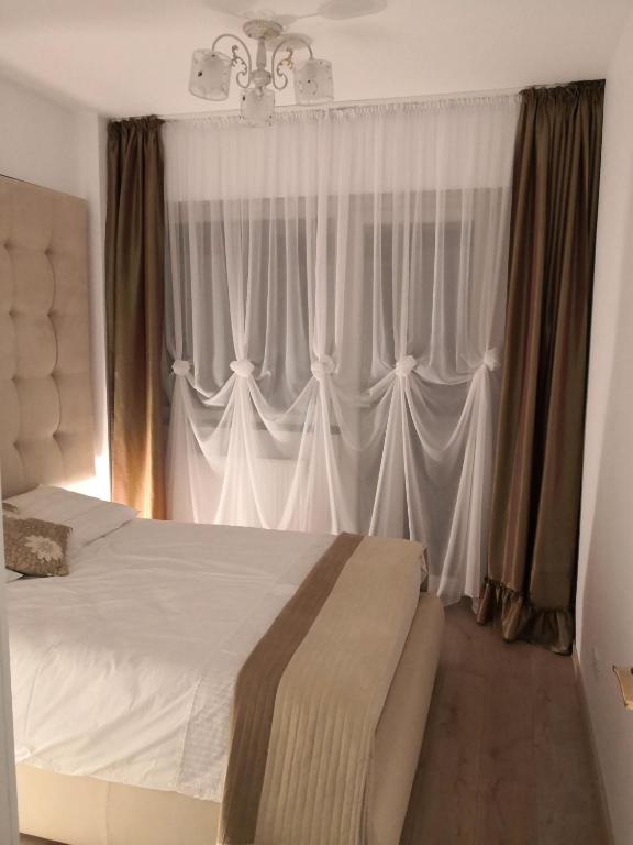 Apartament de lux white&red - Chambres d'hôtes Suceava