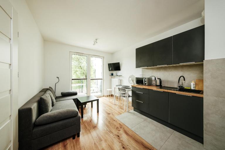 Wygodny apartament niedaleko centrum by Krakow Home - Chambres d'hôtes Cracovie